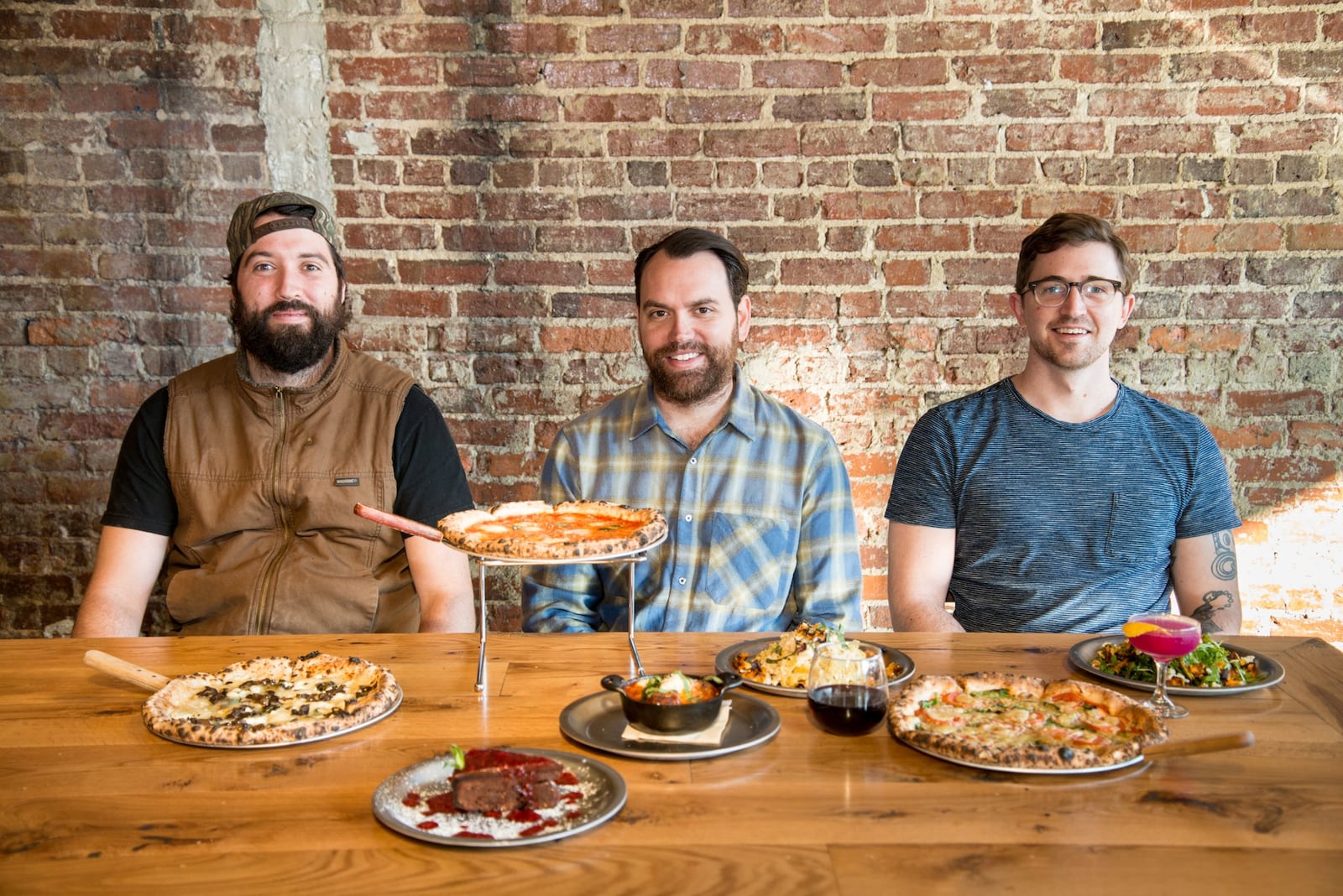 Ammazza Decatur team (from left to right) Executive Chef Sean Dwyer, Owner Hugh Connerty, and Beverage Director and General Manager Daniel Bridges. Photo credit- Mia Yakel.