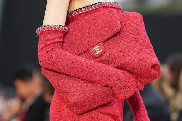 A model wears a creation as part of the Chanel Fall/Winter 2025-2026 Womenswear collection presented Tuesday, March 11, 2025. in Paris. (Photo by Scott A Garfitt/Invision/AP)