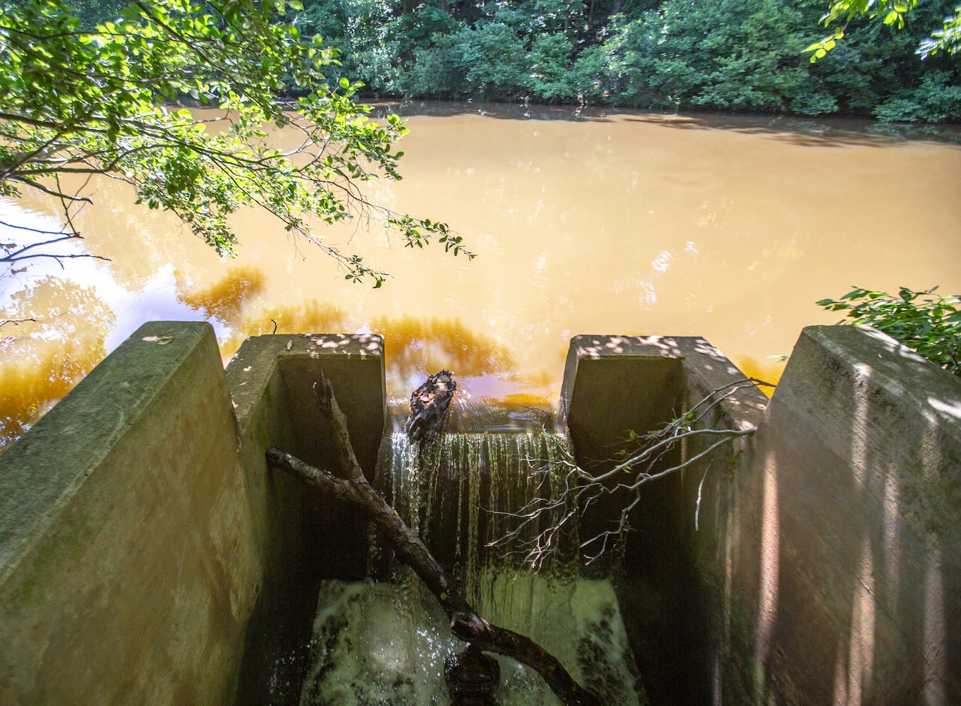 Medlock Bridge in Johns Creek errosion, run off and neglect since the city’s formation has prompted a utility fee to begin to address the problem.