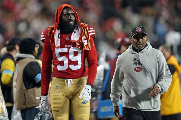 San Francisco 49ers' De'Vondre Campbell walks to the locker room during the second half of an NFL football game against the Los Angeles Rams in Santa Clara, Calif., Thursday, Dec. 12, 2024. (Scott Strazzante/San Francisco Chronicle via AP)