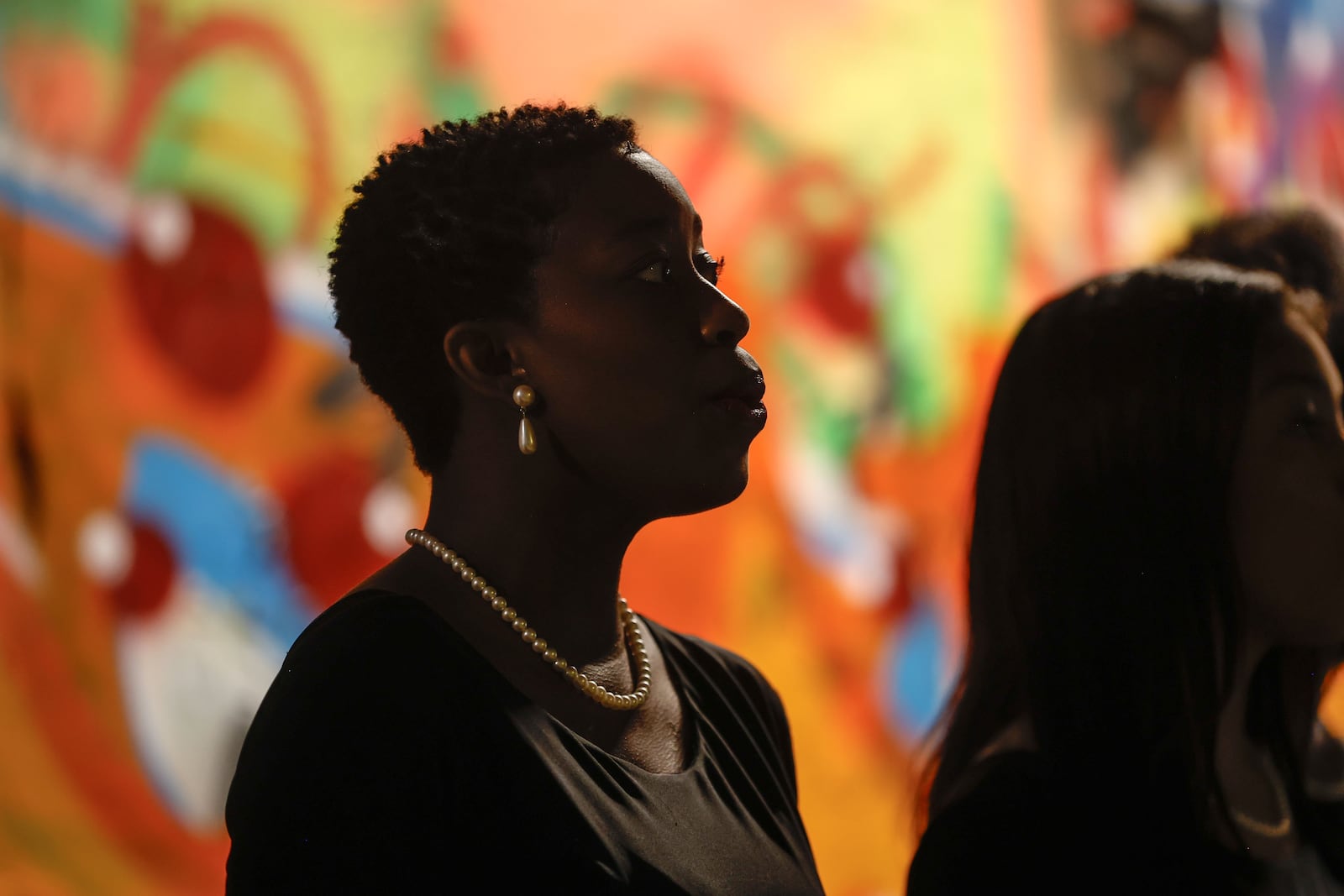 Elycia Woodham, a senior music major at Spelman College  sings a solo during a performance with the Spelman Glee Club inside Krog Street Tunnel on Thursday, March 7, 2024. The performance is part of the Creative Placemaking Summit taking place in Atlanta from March 5-8. (Natrice Miller/ Natrice.miller@ajc.com)