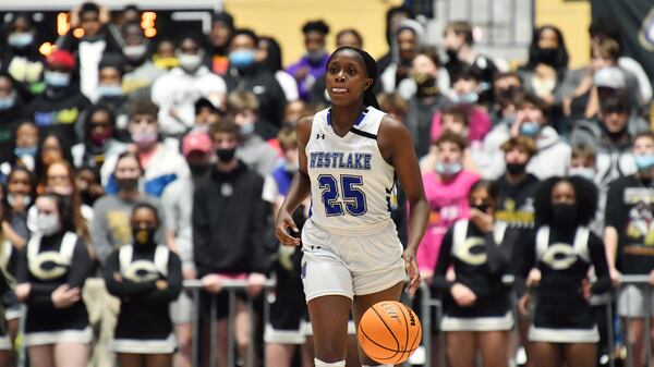 Westlake's Raven Johnson (25) brings the ball upcourt during the Class 6A girls basketball championship game Friday, March 12, 2021, against Carrollton at the Macon Centreplex in Macon.