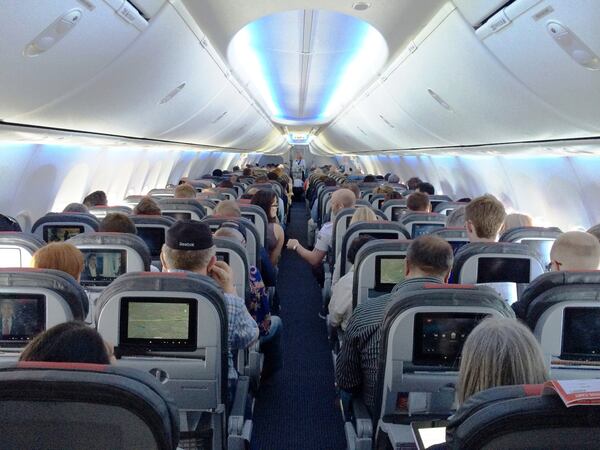 One of American Airlines' new 737s. The cabin gives standard economy passengers less space, but also an entertainment system to distract them. (Josh Noel/Chicago Tribune/MCT)