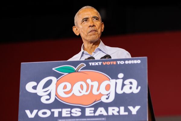 Former President Barack Obama speaks at a campaign event for U.S. Sen. Raphael Warnock and other Democrats in Atlanta on Oct. 28, 2022.  (Arvin Temkar/AJC)