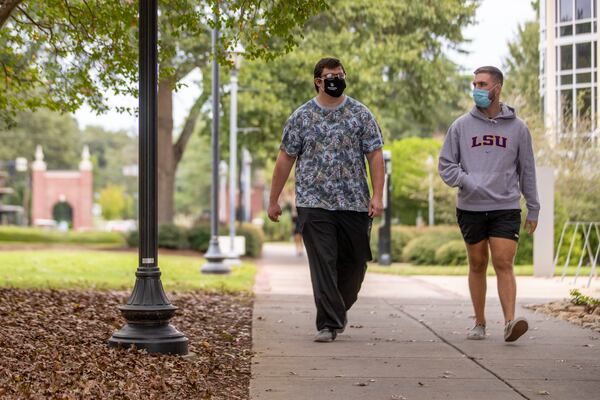 09/15/2020 - Augusta, Georgia - Augusta University seniors Mason Ryals (right) and Thomas Ellis (left) talk amongst themselves while walking through campus at Augusta UniversityÕs Summerville location in Augusta, Tuesday, September 15, 2020. (Alyssa Pointer / Alyssa.Pointer@ajc.com)