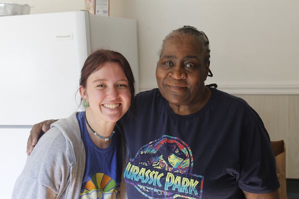 Sierra Bastis, a 22-year-old University of Georgia student and an intern at the Athens Community Council on Aging, poses with ACCA client Linda Dunn in Athens, Georgia, on Tuesday, Nov. 7, 2023.  Bastis connects older adults in Athens with supplemental groceries through the ACCA's Senior Staples program.  (Photo Courtesy of Lilly Kersh)