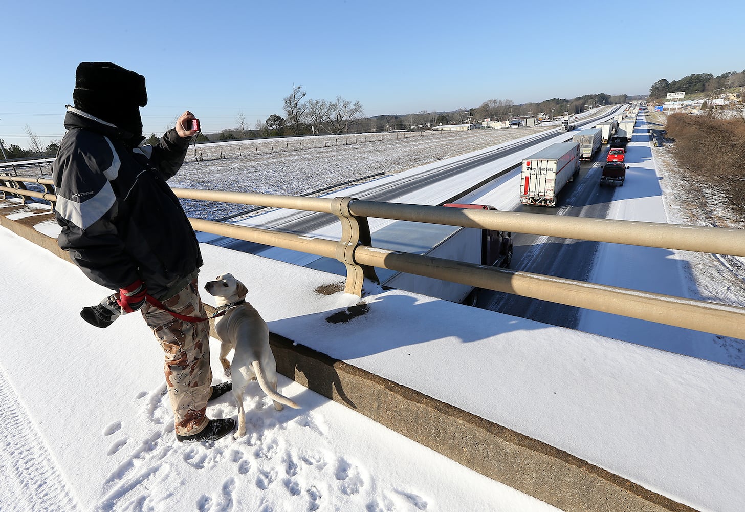 Photos: Frigid cold and snow move in to metro Atlanta