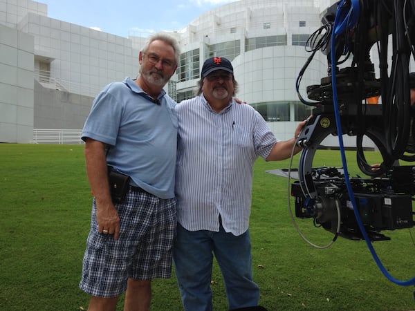 Bryan (left) and cinematographer David Dunlap on location outside the High Museum of Art in Atlanta during the filming of “Insurgent.” (Photo courtesy of Clyde E. Bryan.)