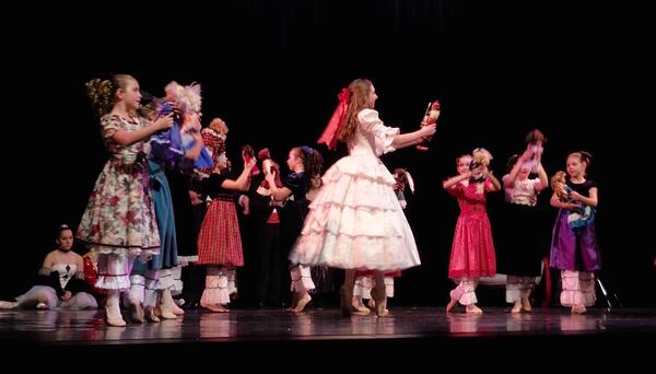 Claire Houlihan, center, dances the role of Clara in "The Nutcracker." Photo: Jennifer Brett