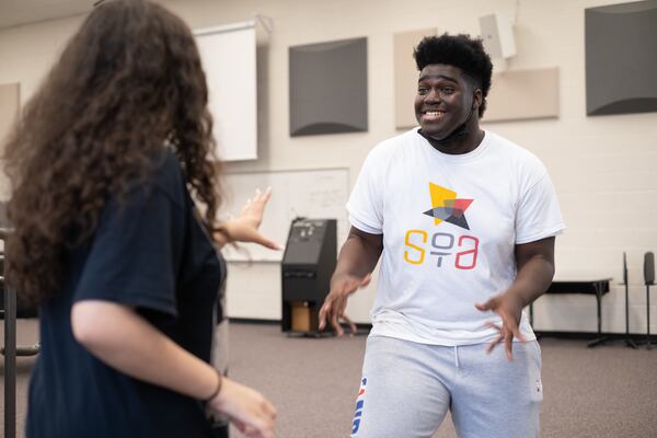 211208-Lawrenceville-Jordan Zarwea rehearses a musical number at the new Gwinnett School of the Arts in Lawrenceville on Wednesday, Dec. 8, 2021. Ben Gray for the Atlanta Journal-Constitution