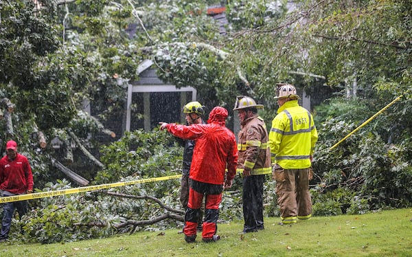 September 11, 2017 Atlanta: A sleeping Sandy Springs man died Monday after a tree crashed through his home. JOHN SPINK/JSPINK@AJC.COM