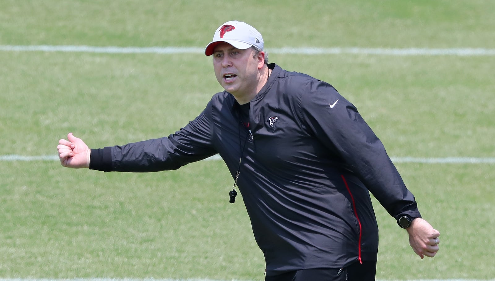 Falcons head coach Arthur Smith urges his team to hustle during organized team activities (OTAs) Tuesday, May 25, 2021, at the team training facility in Flowery Branch. (Curtis Compton / Curtis.Compton@ajc.com)