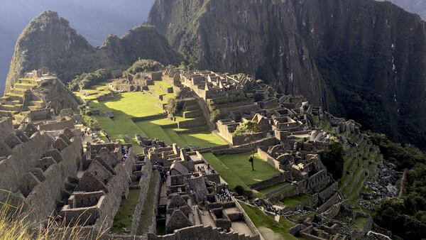 Machu Picchu&apos;s citadel near sunset with Huayna Picchu&apos;s sharp peak looming behind it. (Chris Riemenschneider/Minneapolis Star Tribune/TNS)