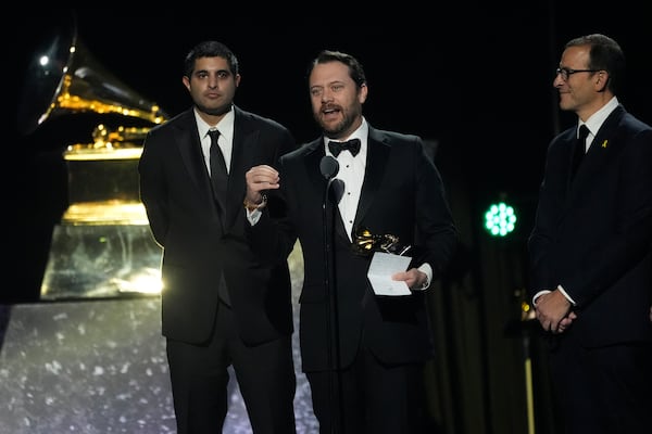 Kabir Sehgal (left) and Jimmy Carter's grandson, Jason Carter, accept the award for best audiobook, narration, and storytelling recording for "Last Sundays in Plains: A Centennial Celebration" during the 67th annual Grammy Awards on Sunday, Feb. 2, 2025, in Los Angeles. Jason Carter accepted the award on his late grandfather's behalf - the book is a collection of the former president's Sunday school lessons. (AP Photo/Chris Pizzello)