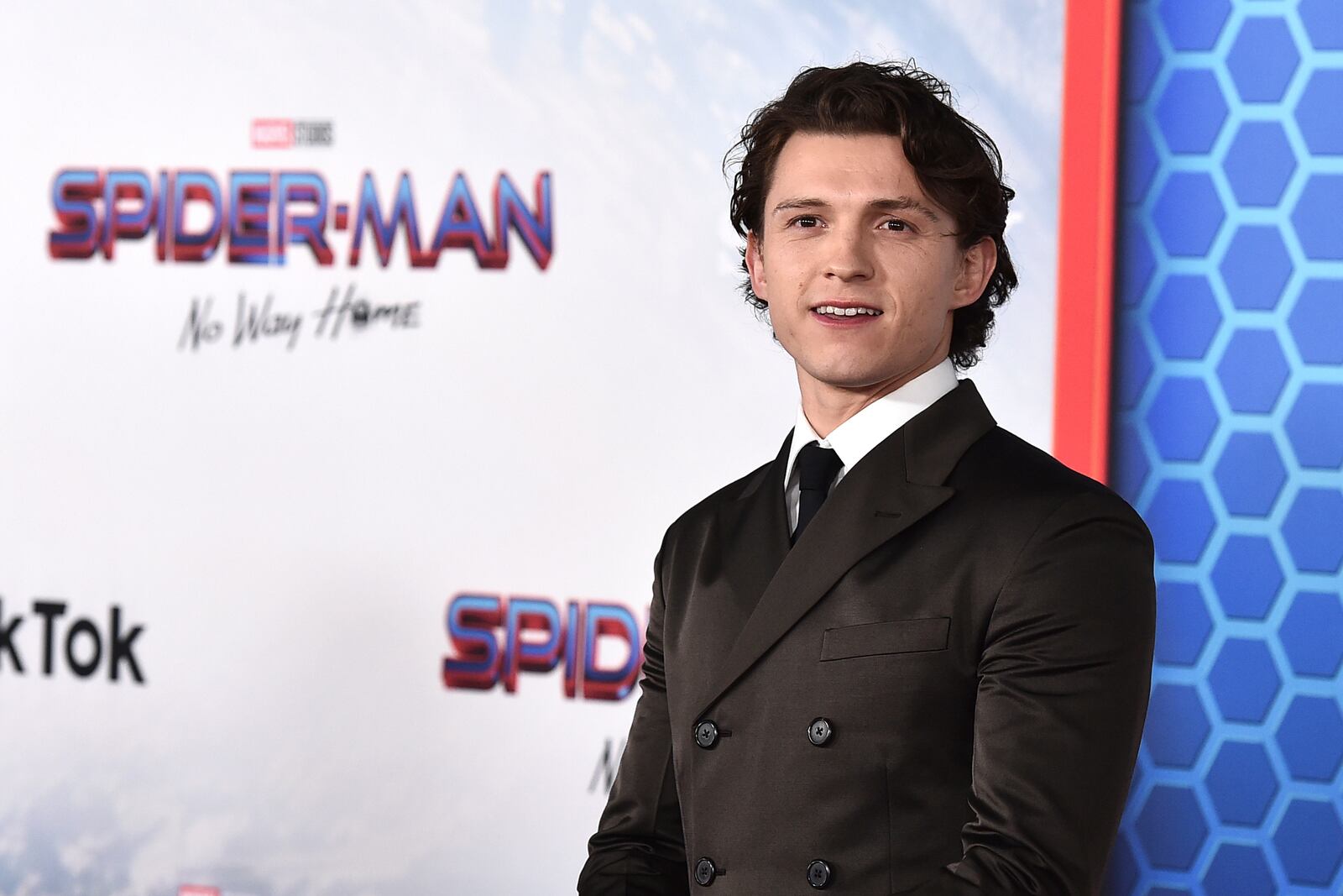 FILE - Tom Holland appears at the premiere of "Spider-Man: No Way Home" in Los Angeles on Dec. 13, 2021. (Photo by Jordan Strauss/Invision/AP, File)