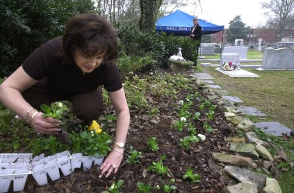 Patsy Ramsey, along with a sister and friends of her family, were at Jon Benet's gravesite in Marietta planting pansies on Dec. 17, 2001.