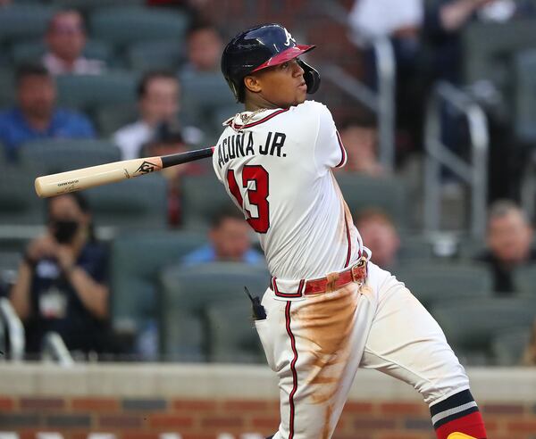 Braves outfielder Ronald Acuna hits a solo home run to take a 2-0 lead over the Toronto Blue Jays during the third inning in a MLB baseball game on Tuesday, May 11, 2021, in Atlanta.    “Curtis Compton / Curtis.Compton@ajc.com”