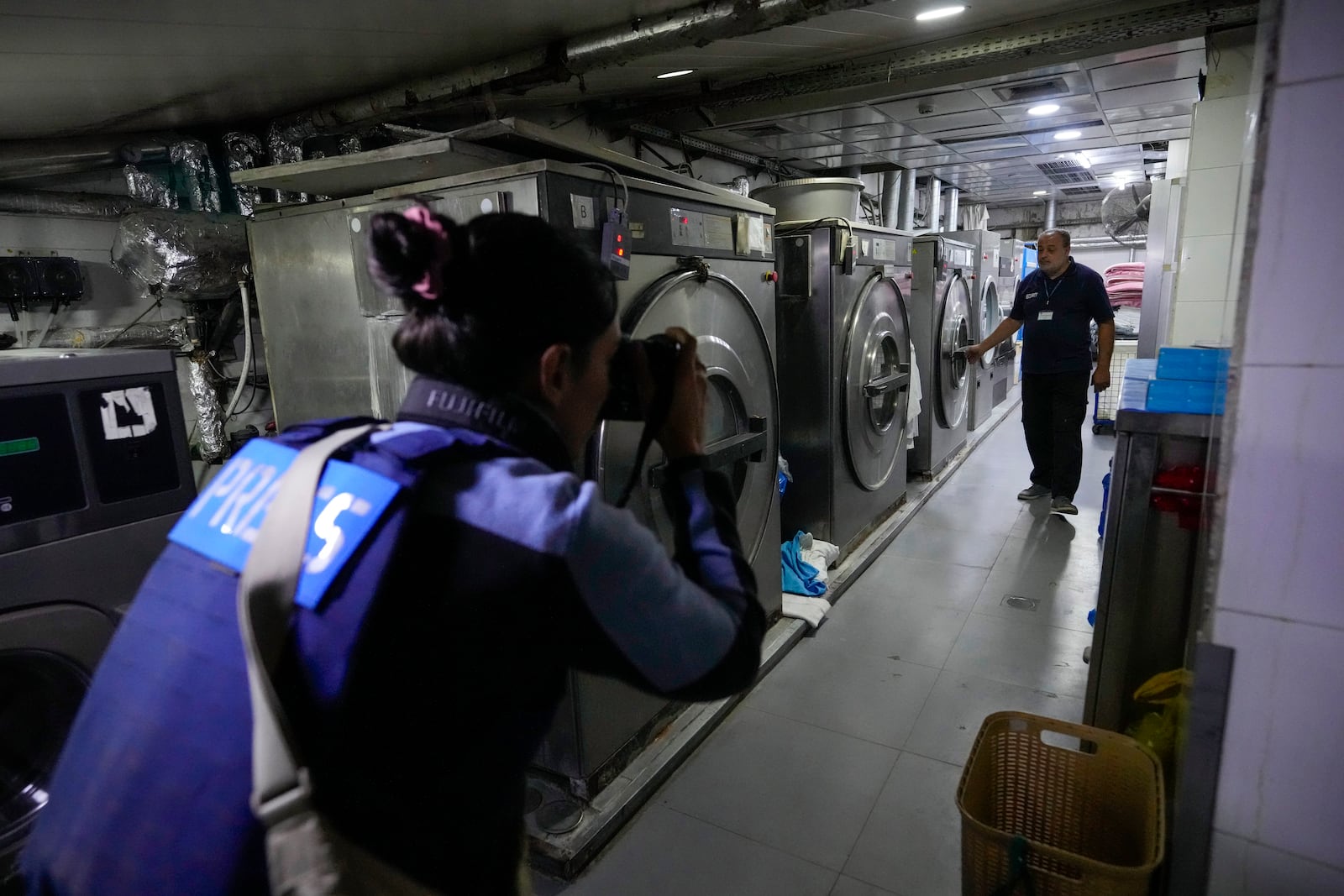 Foreign and local journalists take a tour inside Sahel General Hospital, in Dahiyeh, Beirut, Lebanon, Tuesday, Oct. 22, 2024. (AP Photo/Hassan Ammar)