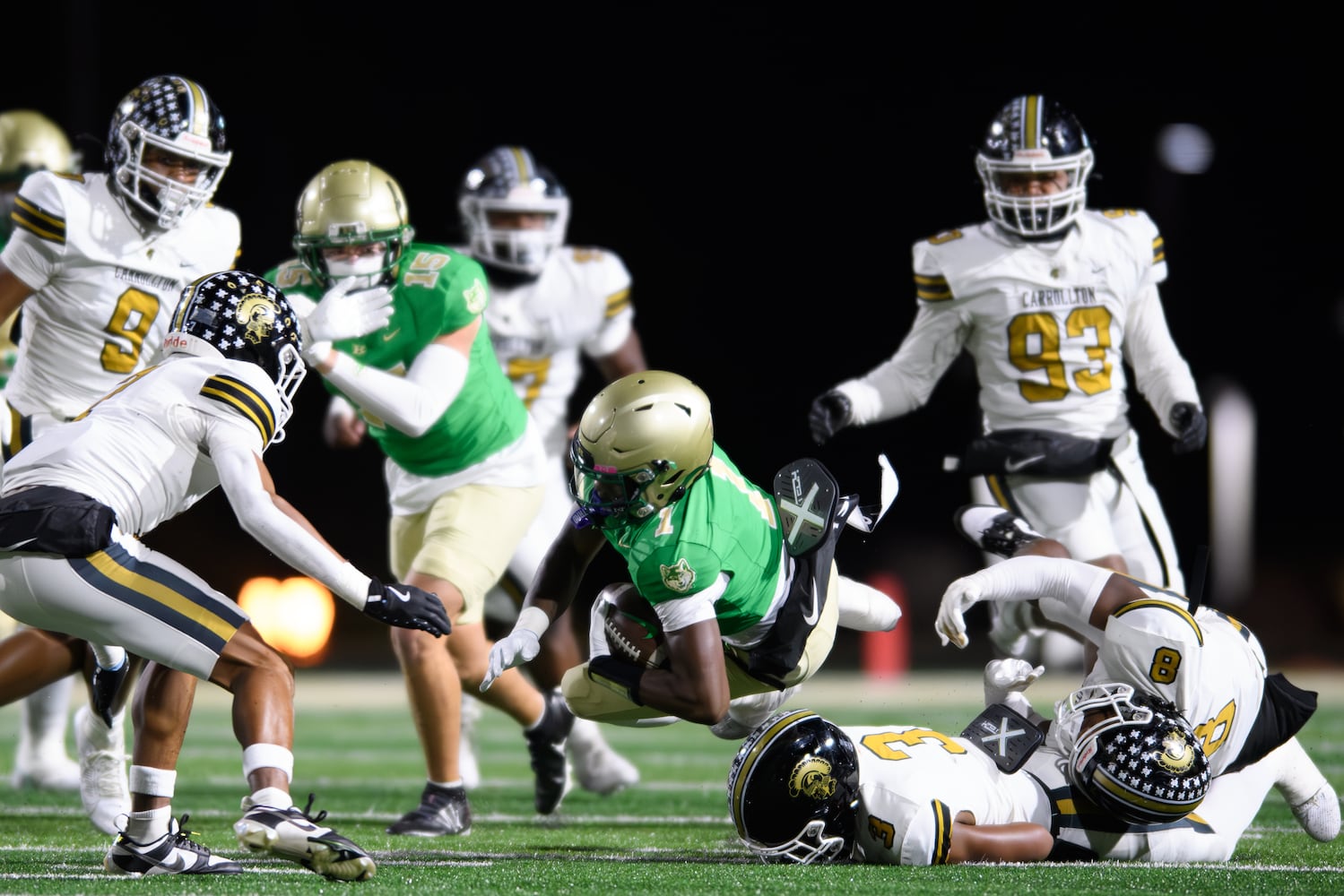 Buford's Ethan Ervin is tackled. (Jamie Spaar for the Atlanta Journal Constitution)