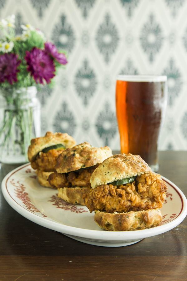 Hampton Hot Chicken Biscuit Sliders, served on fresh herb and cheddar biscuits that are made daily in-house. PHOTO CREDIT: Tomas Espinoza