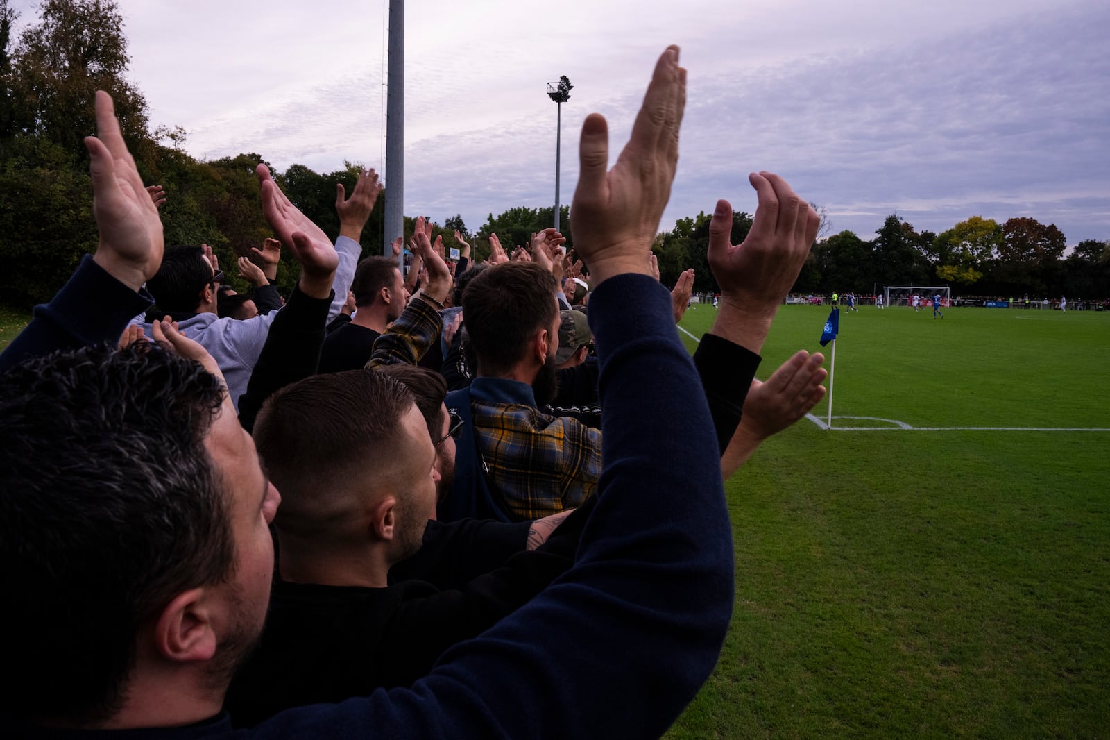 Bordeaux fan group 'Ultramarines' watch from the sidelines during the Championnat National 2 soccer match between Saumur and Bordeaux, in Saumur, France, Saturday, Oct. 5, 2024.(AP Photo/Louise Delmotte)