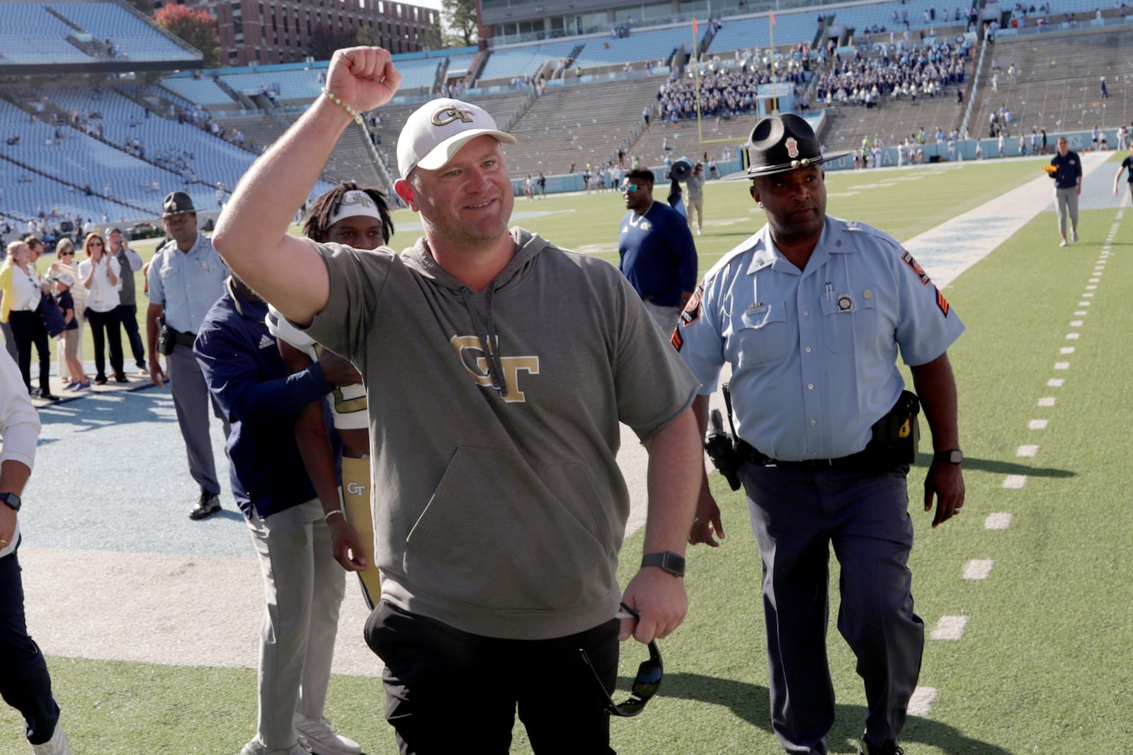 Georgia Tech head coach Brent Key gestures to the fans as he walks off the field after his team defeated North Carolina in an NCAA college football game, Saturday, Oct. 12, 2024, in Chapel Hill, N.C. (AP Photo/Chris Seward)