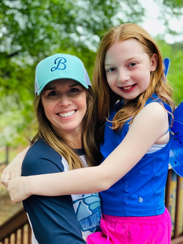 Atlanta corporate attorney Amy Douglass (left) and her daughter Ella Perry have lived through the battle with Crohn's disease, which Ella Perry was diagnosed with at age 10. Ella Perry is in remission now. Courtesy of Amy Douglass