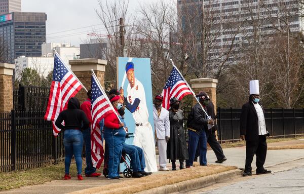 Mourners including the SCLA Decatur group pay respect to baseball legend Hank Aaron at his funeral Wednesday, Jan 27, 2021 at Friendship Baptist Church in Atlanta.  (Jenni Girtman for The Atlanta Journal-Constitution)