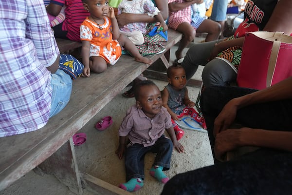 Women wait to have the malaria vaccine R21/Matrix-M administered to their children at the comprehensive Health Centre in Agudama-Epie, in Yenagoa, Nigeria, Monday, Dec. 9, 2024. (AP Photo/Sunday Alamba)