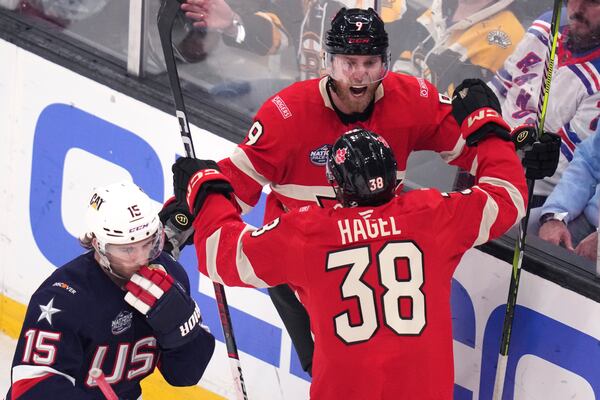 Canada's Sam Bennett (9) celebrates after his goal against the United States during the second period of the 4 Nations Face-Off championship hockey game, Thursday, Feb. 20, 2025, in Boston. (AP Photo/Charles Krupa)