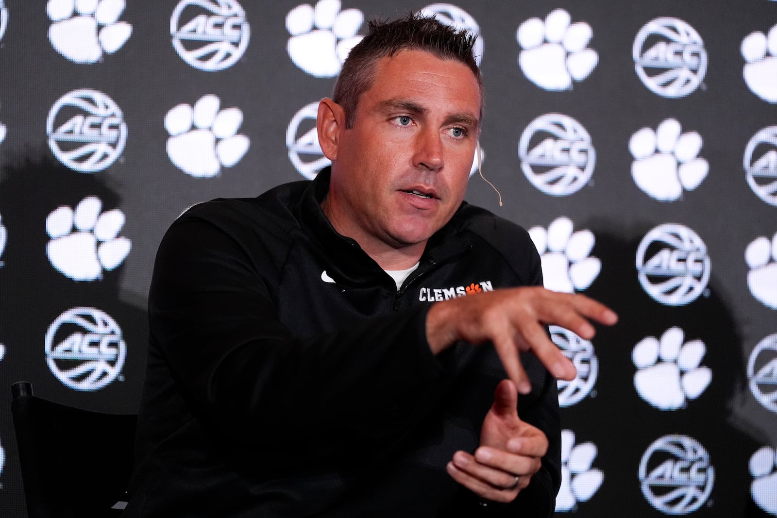 Clemson Head Coach Shawn Poppie speaks during a ACC women's basketball media day, Tuesday, Oct. 8, 2024, in Charlotte, N.C. (AP Photo/Chris Carlson)