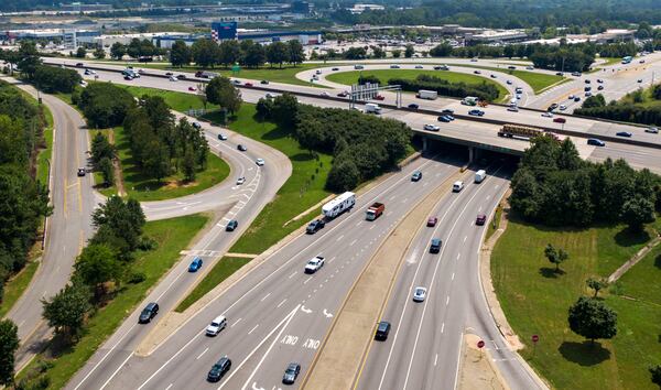 July 22, 2021 Doraville - Aerial photo shows I-285 (center) and Peachtree Industrial Boulevard (L-northbound, R-southbound) in Doraville on Thursday, July 22, 2021. Combine the I-285 exit ramps to Peachtree Industrial Boulevard north and south and adjust the horizontal curve of the north exit ramp to reduce a bottleneck from I-285. (Hyosub Shin / Hyosub.Shin@ajc.com)