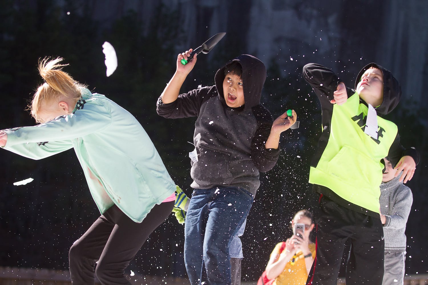 Photos: Playing in snow at Stone Mountain Park