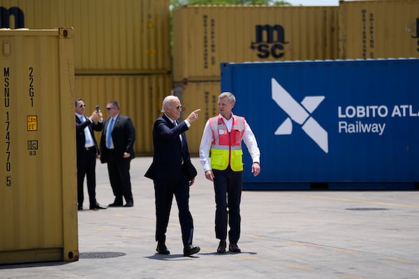 President Joe Biden and Chief Operating Officer of Lobito Atlantic Railway Nicolas Gregoire tour the Lobito Port Terminal in Lobito, Angola, on Wednesday, Dec. 4, 2024. (AP Photo/Ben Curtis)