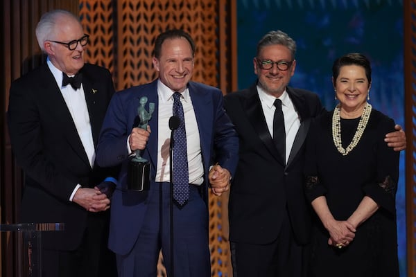 John Lithgow, from left, Ralph Fiennes, Sergio Castellitto, and Isabella Rossellini accepts the award for outstanding performance by a cast in a motion picture for "Conclave" during the 31st annual Screen Actors Guild Awards on Sunday, Feb. 23, 2025, at the Shrine Auditorium in Los Angeles. (AP Photo/Chris Pizzello)