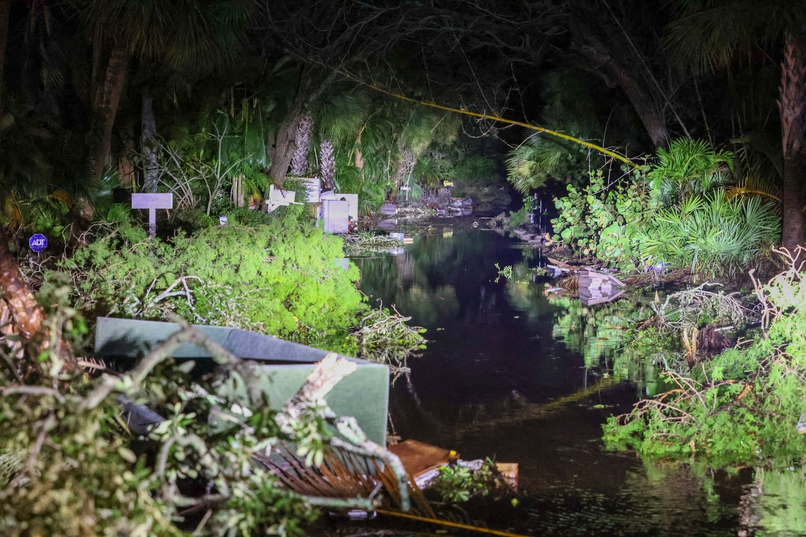 Debris along Commonwealth Drive clogs the roadway after Hurricane Milton made landfall nearby Thursday, Oct. 10, 2024 in Siesta Key, Fla. (Chris Urso/Tampa Bay Times via AP)