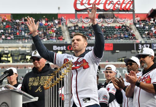 Freddie Freeman waves to fans during a Nov. 5, 2021, ceremony at Truist Park celebrating the Braves' World Series championship. (Hyosub Shin / Hyosub.Shin@ajc.com)