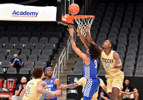 Georgia Tech forward Moses Wright (5) blocks the shot by Kentucky forward Olivier Sarr (30) in the first half of the Pit Boss Grills Holiday Hoopsgiving Sunday, Dec. 6, 2020, at State Farm Arena in Atlanta. Georgia Tech won 79-62. (Hyosub Shin / Hyosub.Shin@ajc.com)