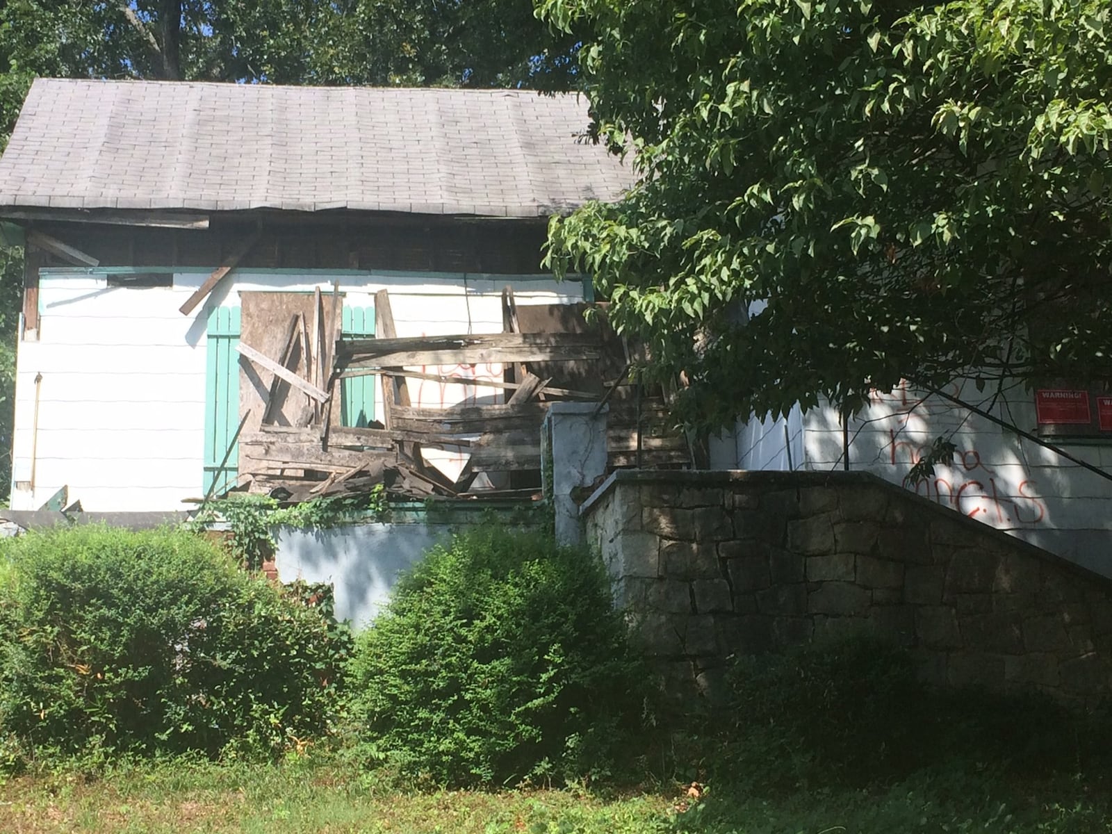 Atlanta’s codes department is cracking down on unhealthy rooming houses, as it also is hoping to be able to more quickly tear down crumbling abandoned houses (such as this one across from 575 Joseph E. Lowery Blvd.). BILL TORPY / BTORPY@AJC.COM