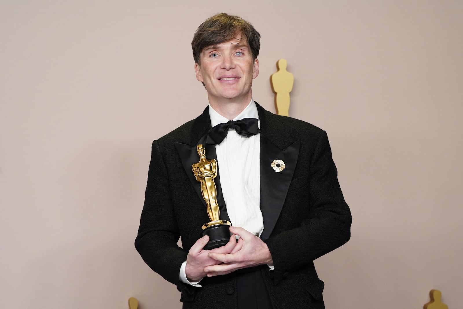 FILE - Cillian Murphy poses in the press room with the award for best performance by an actor in a leading role for "Oppenheimer" at the Oscars in Los Angeles on March 10, 2024. (Photo by Jordan Strauss/Invision/AP, File)