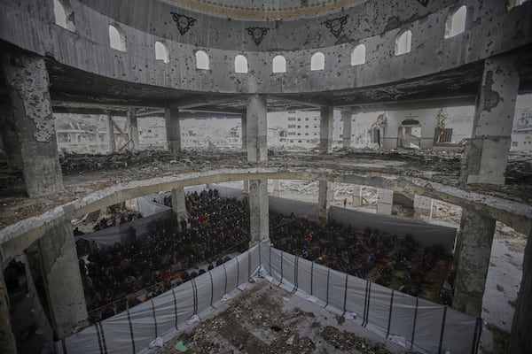 Palestinians pray during the first Friday prayers of the Muslim holy month of Ramadan at the Imam Shafi'i Mosque, damaged by Israeli army strikes, in the Zeitoun neighborhood in Gaza City, Friday March 7, 2025.(AP Photo/(AP Photo/Jehad Alshrafi)