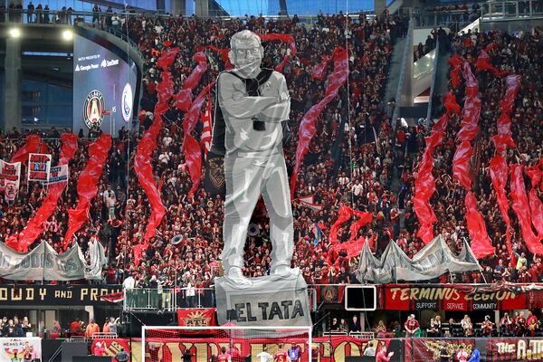 Nov 11, 2018 Atlanta: Atlanta United fans raise a tifo of head coach Gerardo Martino to start the game against New York City during the first half in their MLS Eastern Conference Semifinal playoff match on Sunday, Nov. 11, 2018, in Atlanta.  Curtis Compton/ccompton@ajc.com