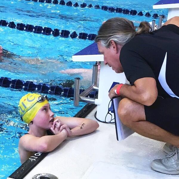 Grace Bunke and her swim coach Pat Eddy. CONTRIBUTED