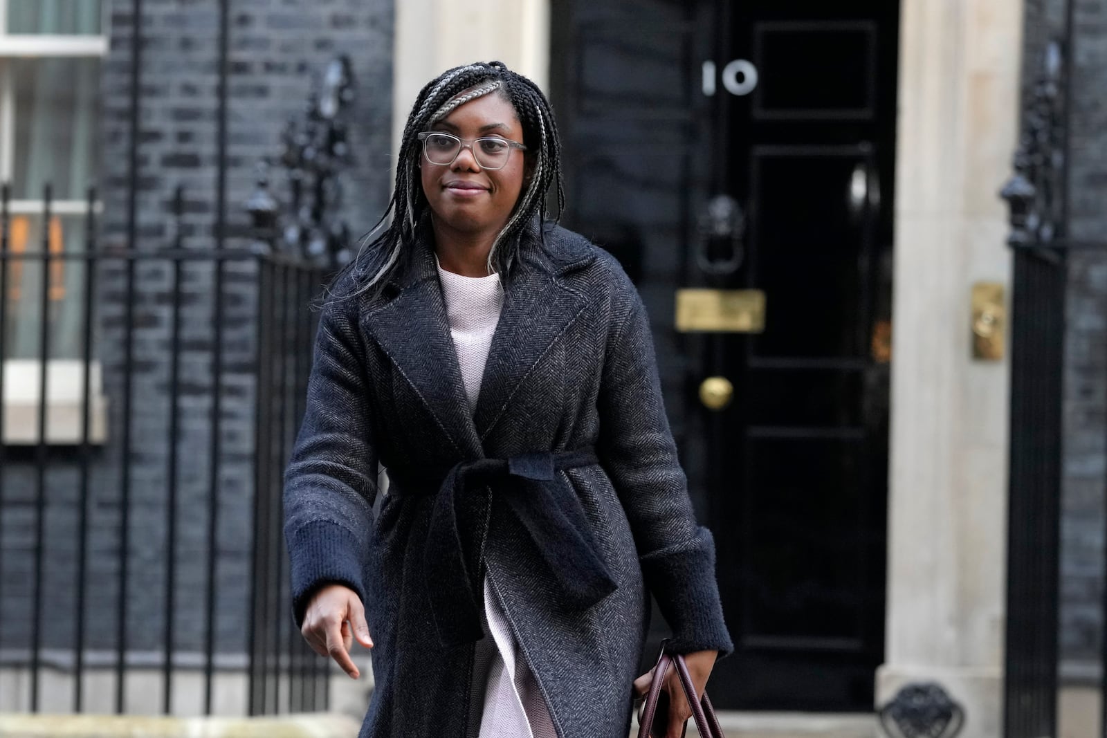 FILE - Kemi Badenoch, Britain's Secretary of State for International Trade and President of the Board of Trade, Minister for Women and Equalities leaves after attending a cabinet meeting in Downing Street in London, on Jan. 17, 2023. (AP Photo/Kirsty Wigglesworth, File)