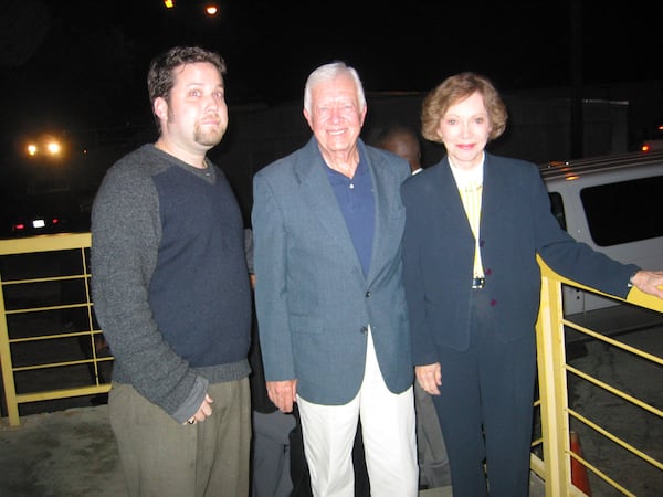 Co-founding Artist Director Sean Daniels (left) with former President Jimmy Carter and Rosalyn Carter at Dad's Garage Theatre. Courtesy of Dad's Garage Theatre