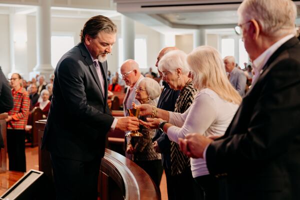 Lead preacher and CEO the Rev. Jody Ray with members of the East Cobb congregation.