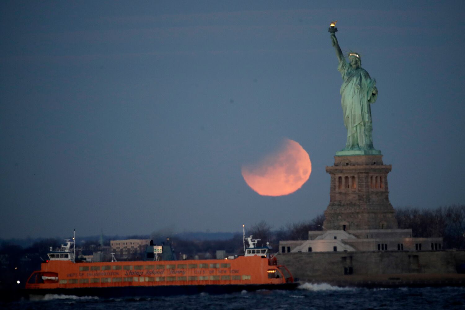 Photos: Super blue blood moon eclipse 2018