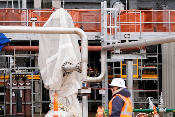 An auxiliary cooler at Entergy's Orange County Advanced Power Station, a 1,215-megawatt facility under construction, is shown on Monday, Feb. 24, 2025, in Orange, Texas. (AP Photo/David J. Phillip)