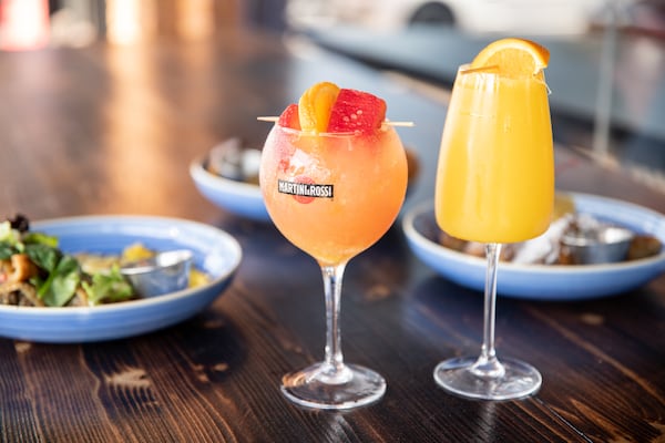 The Breakfast Boys' White Sangria and Orange Mimosa. (Mia Yakel for The Atlanta Journal-Constitution)