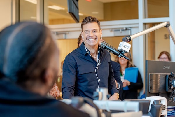 Ryan Seacrest did his national syndicated radio show live from his new Seacrest Studios Oct. 11, 2024 at Children's Healthcare of Atlanta Arthur M. Blank Hospital. Here he is speaking to Atlanta Christian hip-hop artist Lecrae. CONTRIBUTED